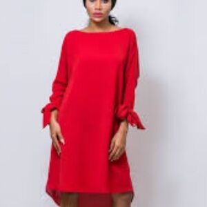 Longer sleeve satiny dress with ties on sleeve